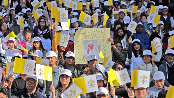 Christian worshipers attend a Mass led by Pope Francis at the Zayed Sports City Stadium in Abu Dhabi, United Arab Emirates, in 2019.