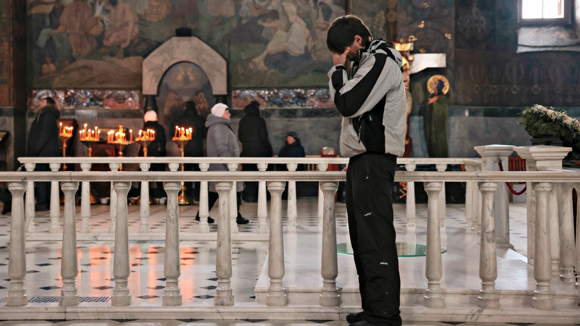People pray at the Kyiv Pechersk Lavra "Monastery of the Caves" on December 4, 2022 in Kyiv, Ukraine.