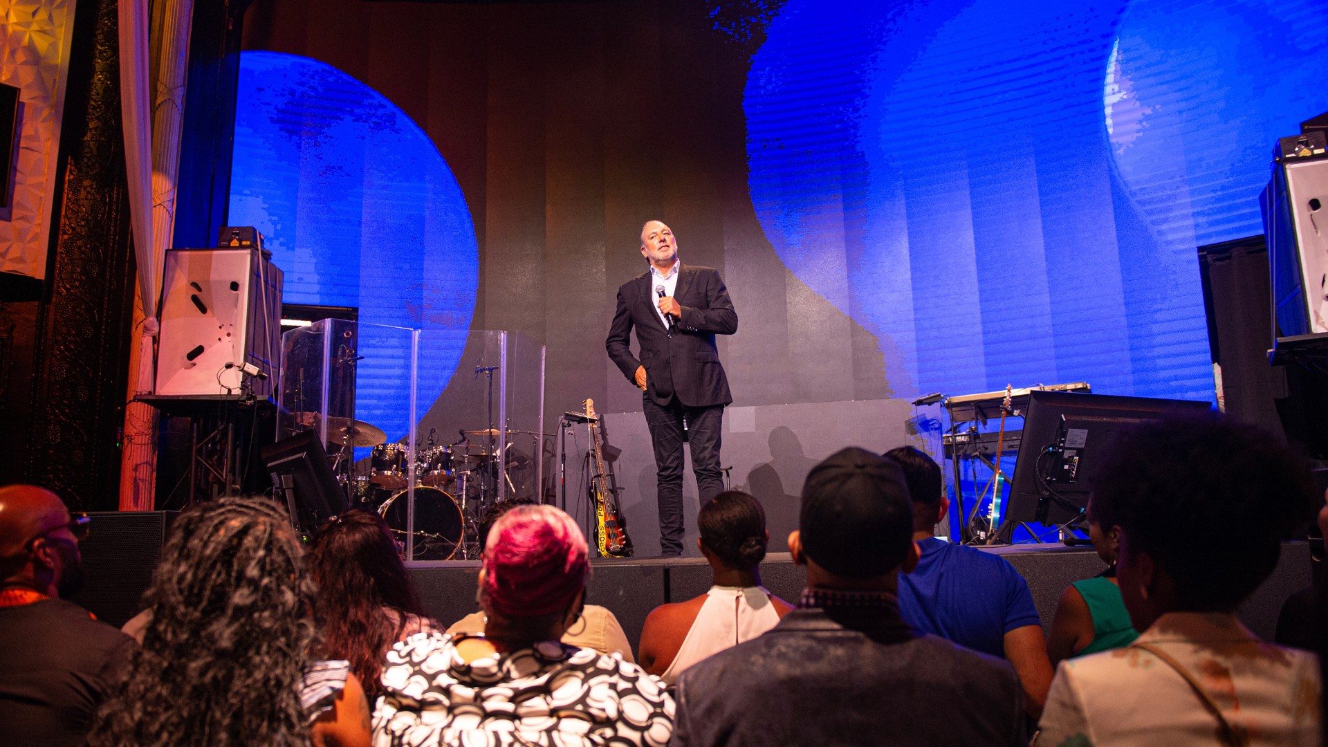 Global Senior Pastor Brian Houston speaks on stage in Atlanta in 2021.