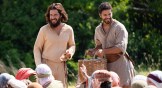 Jesus and Simon the Zealot feed the hungry crowd.