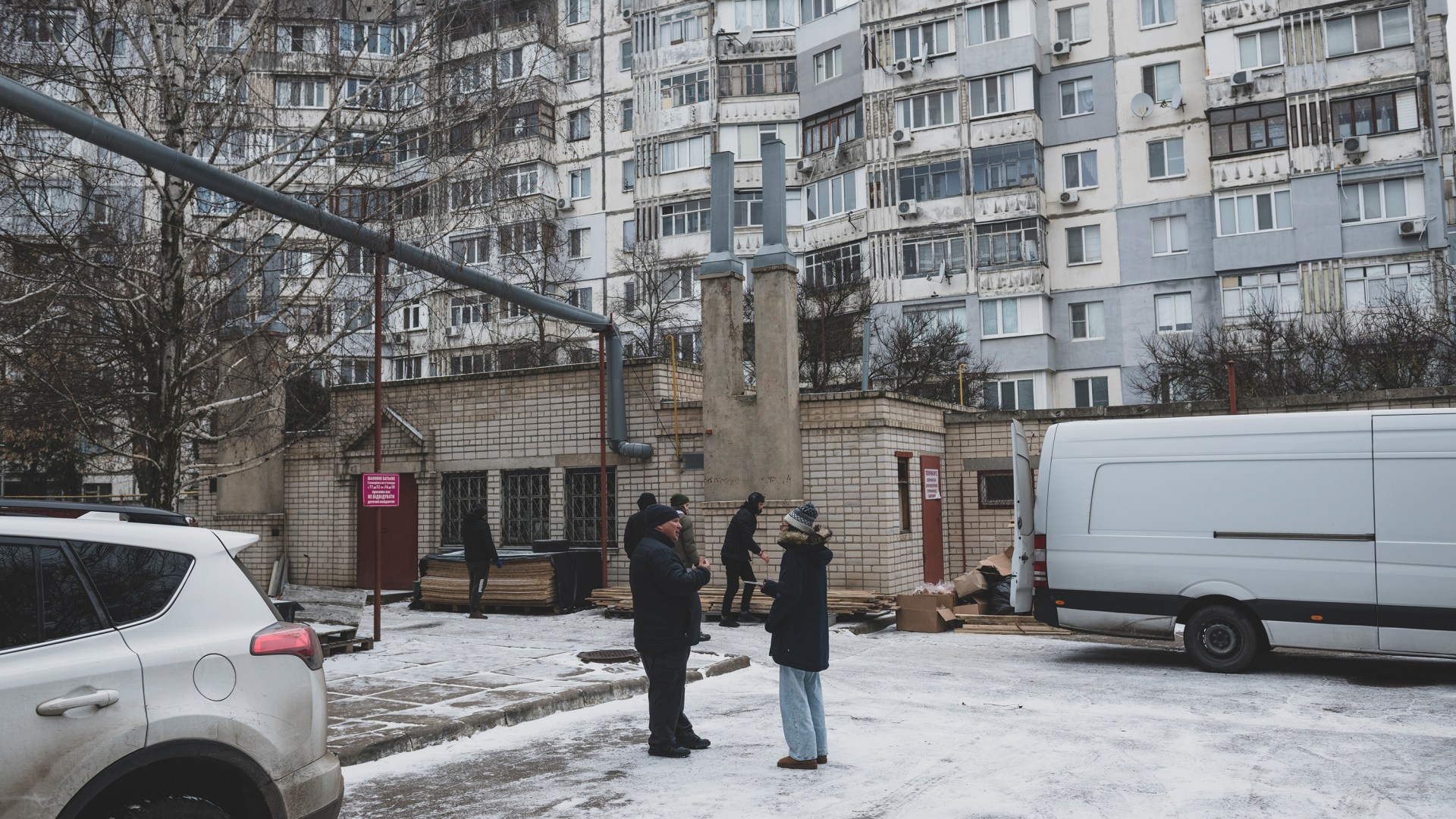 Outside a church in Kherson, Ukraine, Sophia Lee interviews pastors and volunteers.