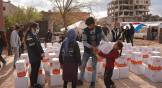 A convoy delivers aid in northwest Syria.