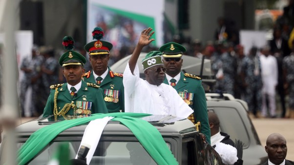 Bola Ahmed Tinubu waves to people after being sworn in as Nigeria's new president at a ceremony in Abuja, Nigeria, on May 29, 2023.