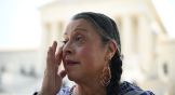 Alabama-Coushatta Tribe of Texas, Tribal Council Vice Chairperson, Nita Battise, wipes away tears outside the US Supreme Court after it upheld the Indian Child Welfare Act.