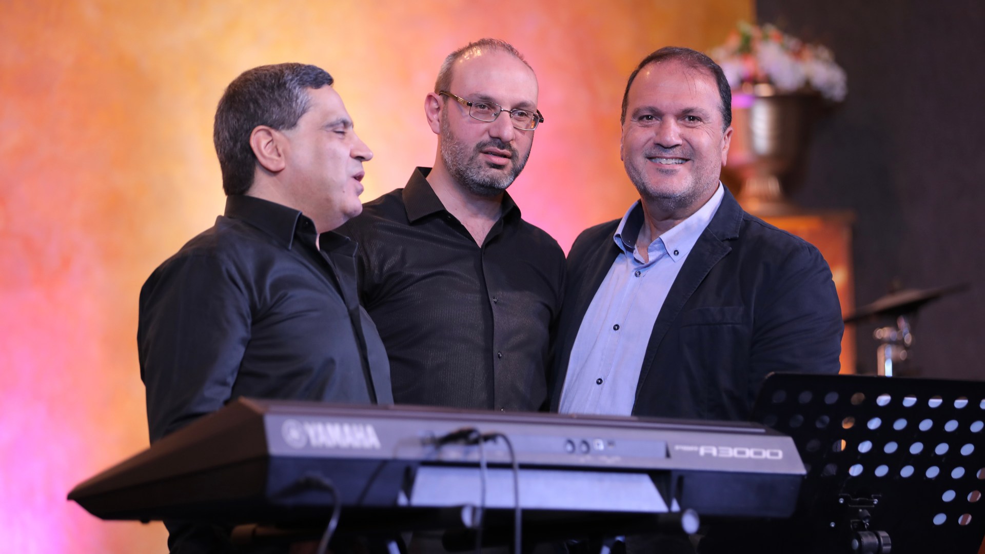 Boutros Wehbe (right) partnering with blind musicians in Lebanon.