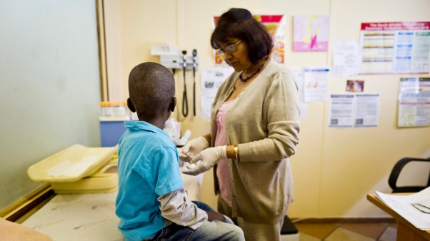 A boy receives an HIV test at a PEPFAR-funded clinic in South Africa.
