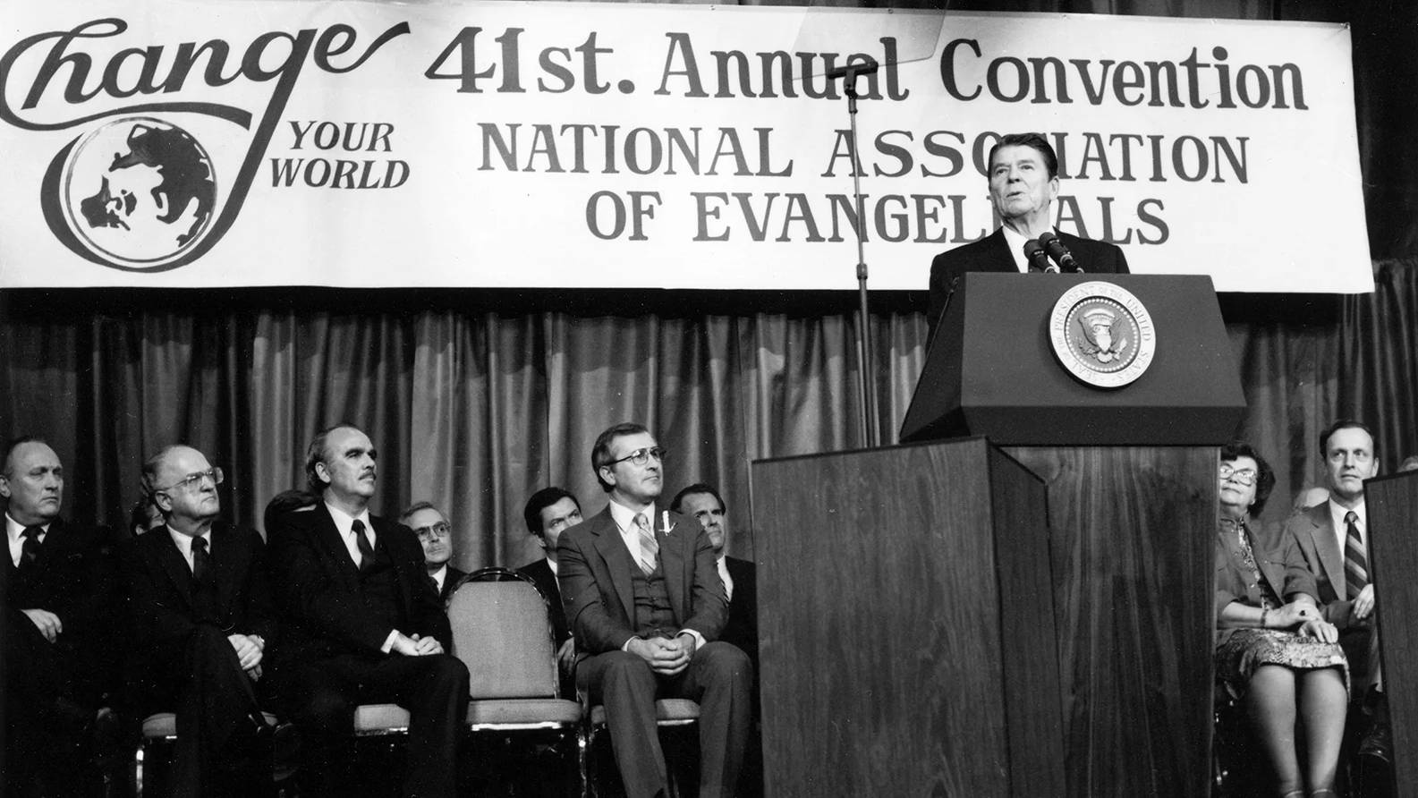 NAE President Arthur Gay (seated to the left of the lectern) introduced President Ronald Reagan when he spoke at the National Association of Evangelicals annual convention in 1983.