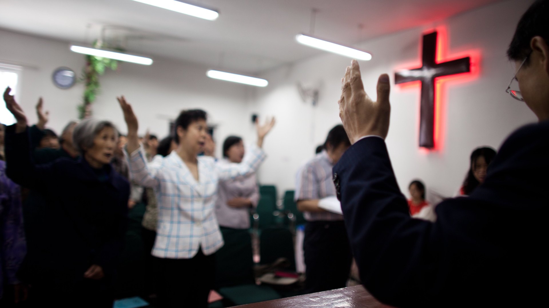 Members of a Chinese house church meet for Sunday worship in Beijing, China.