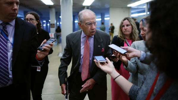 Senator Chuck Grassley talks to reporters.