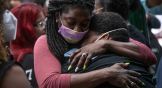 Mourners attend a funeral for COVID-19 victim Conrad Coleman, Jr., at New York Covenant Church in July 2020.