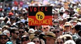 A sign of the Australian Aboriginal Flag referencing the 2023 Australian Indigenous Voice referendum.