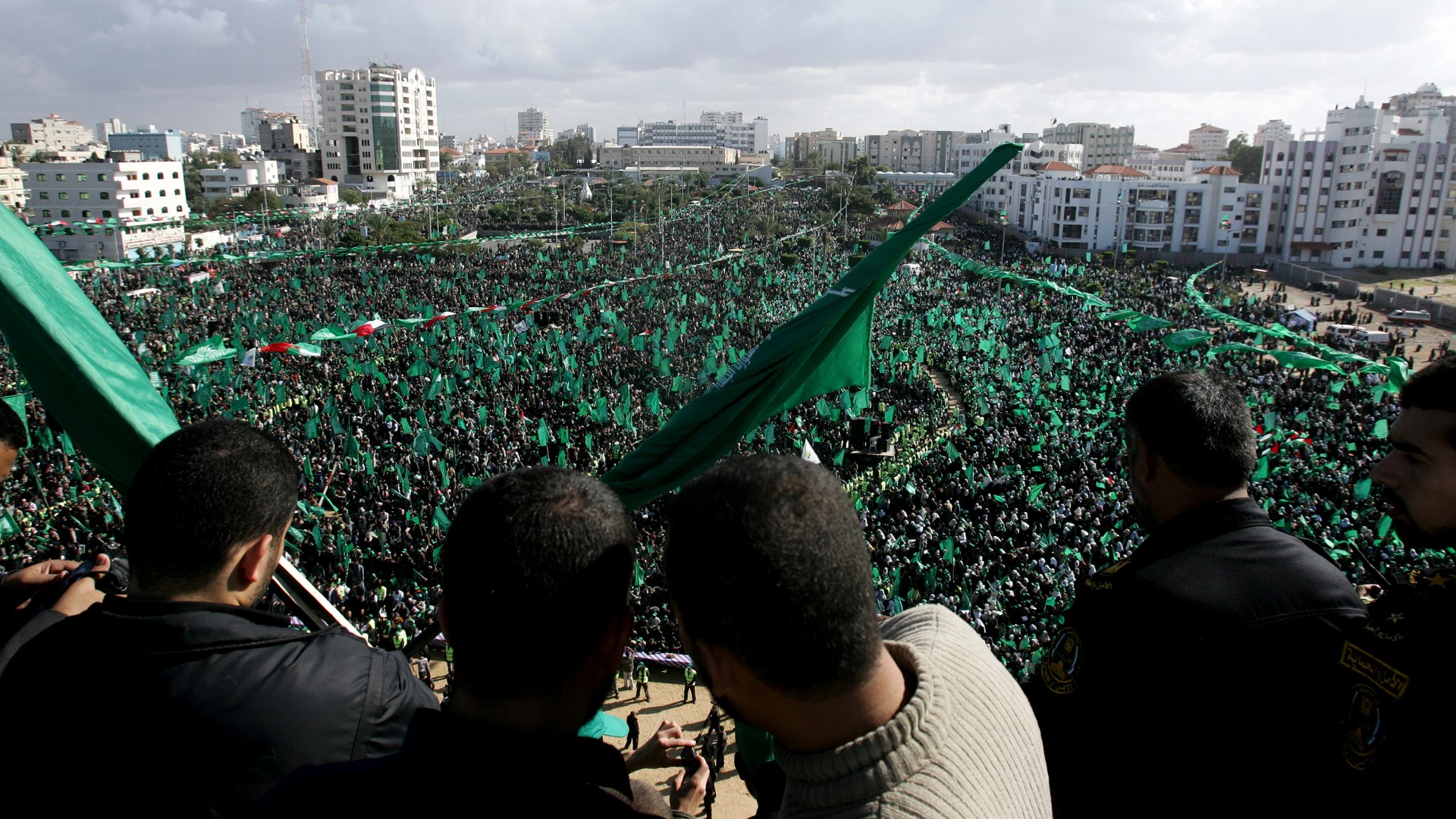 Thousands of Hamas supporters gather at a mass rally in Gaza.