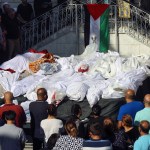 Relatives attend the funeral of Gazan Christians killed after an Israeli airstrike hit next to St. Porphyrius Orthodox Church.