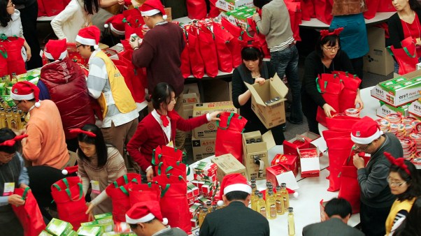 South Koreans pack and wrap Christmas gifts for a charity that delivers gifts to the poor.