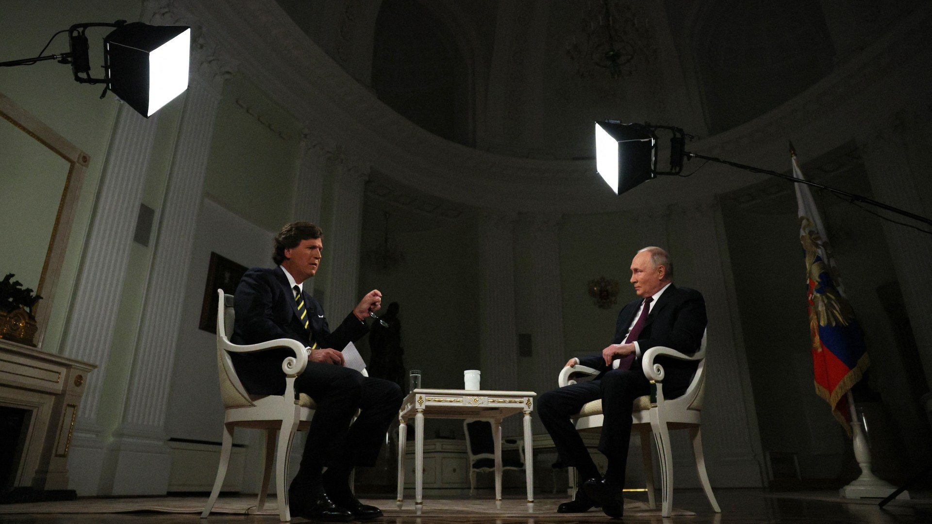Russian President Vladimir Putin gives an interview to US talk show host Tucker Carlson at the Kremlin in Moscow on February 6, 2024, in this pool photograph distributed by Russian state agency Sputnik.