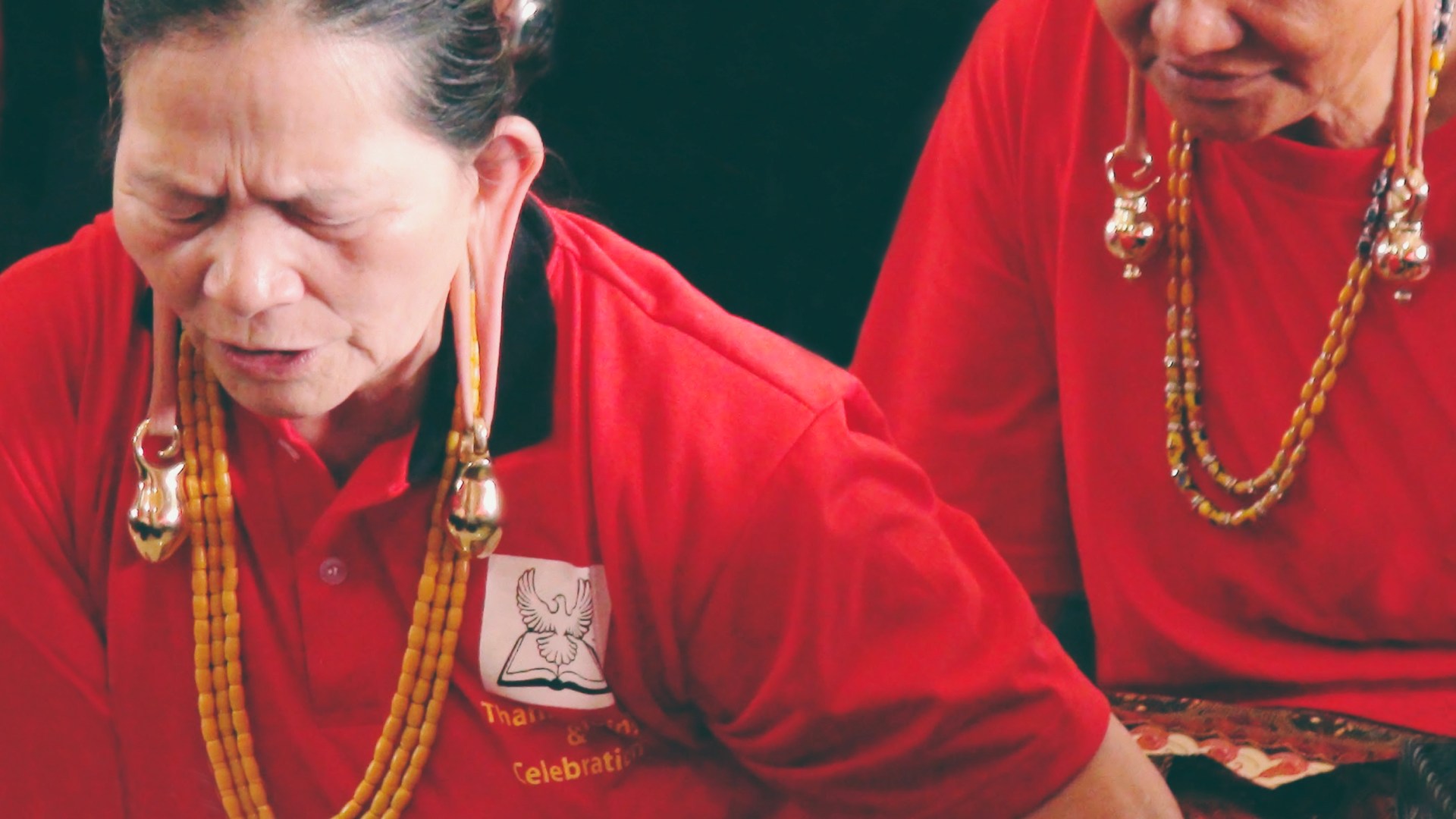 Kelabit women praying.
