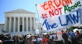 Protesters in front of the US Supreme Court after they ruled that presidents have presumptive immunity for official acts.
