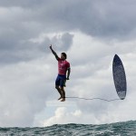 Brazil's Gabriel Medina reacts after getting a large wave in men's surfing during the Paris 2024 Olympic Games.