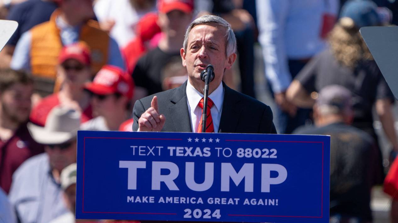 Robert Jeffress of First Baptist Dallas behind a Trump podium