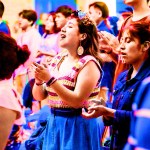 A group of Hispanic people worshipping.