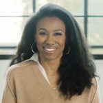 Priscilla Shirer in front of a window