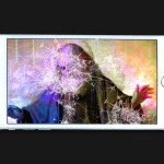 A painting of God on a smartphone with a cracked screen.