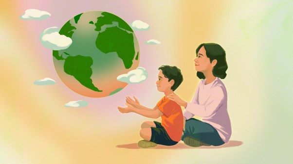 A child and mother staring at the earth