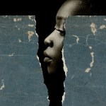 Black woman behind a ripped blue paper