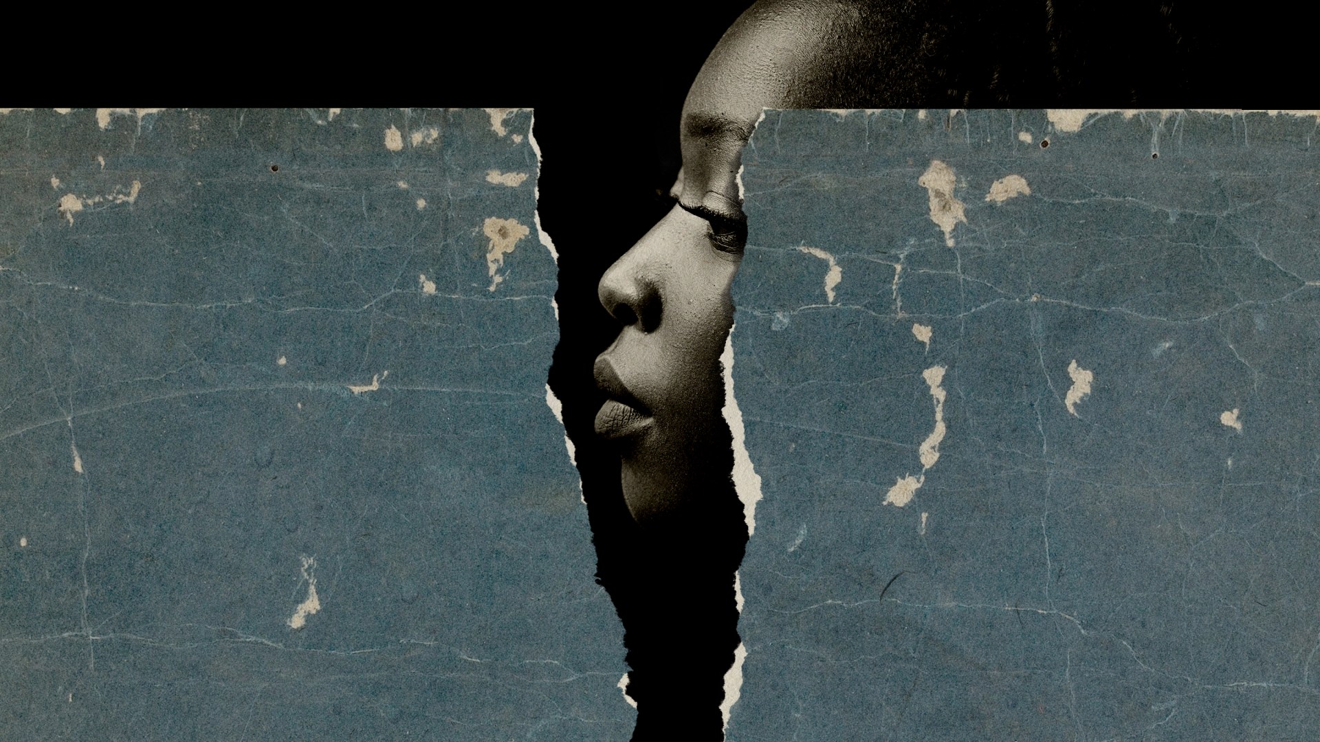 Black woman behind a ripped blue paper