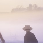 Two boys walking together from the Plain Community