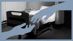 Hands reaching over a hospital bed