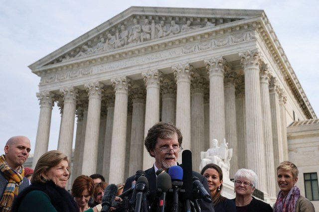 Cake artist Jack Phillips speaks in front of the US Supreme Court