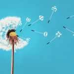A dandelion with language falling from it.