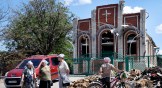 Worshippers leave Sunday service at Sukovska Baptist church in Ukraine.