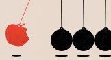 Newton's Cradle with an apple about to hit the other balls