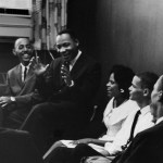 Rev. Dr. Martin Luther King Jr. talking to a group of student sit-in organizers during a strategy meeting to end lunch counter segregation in Atlanta, Georgia.