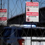 Warning signs are displayed at the Paso del Norte international bridge linking Mexico with Texas.
