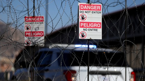 Warning signs are displayed at the Paso del Norte international bridge linking Mexico with Texas.