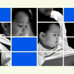 Korean family reading a book together