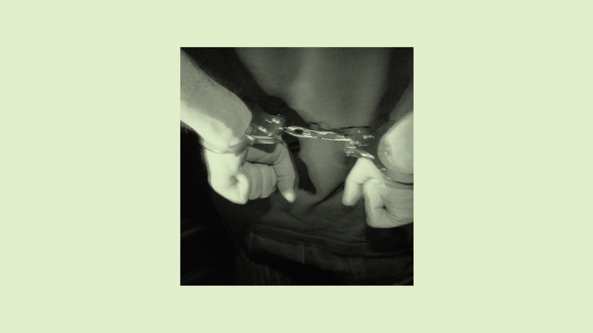 Hands in handcuffs