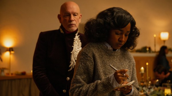 John Malkovich as the legendary pop star, Alfred Moretti, and Ayo Edebiri as the young writer, Ariel Ecton, in Opus.