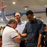 Parishioners pray for undocumented immigrants during a 2023 service at Iglesia Rescate in Miami.