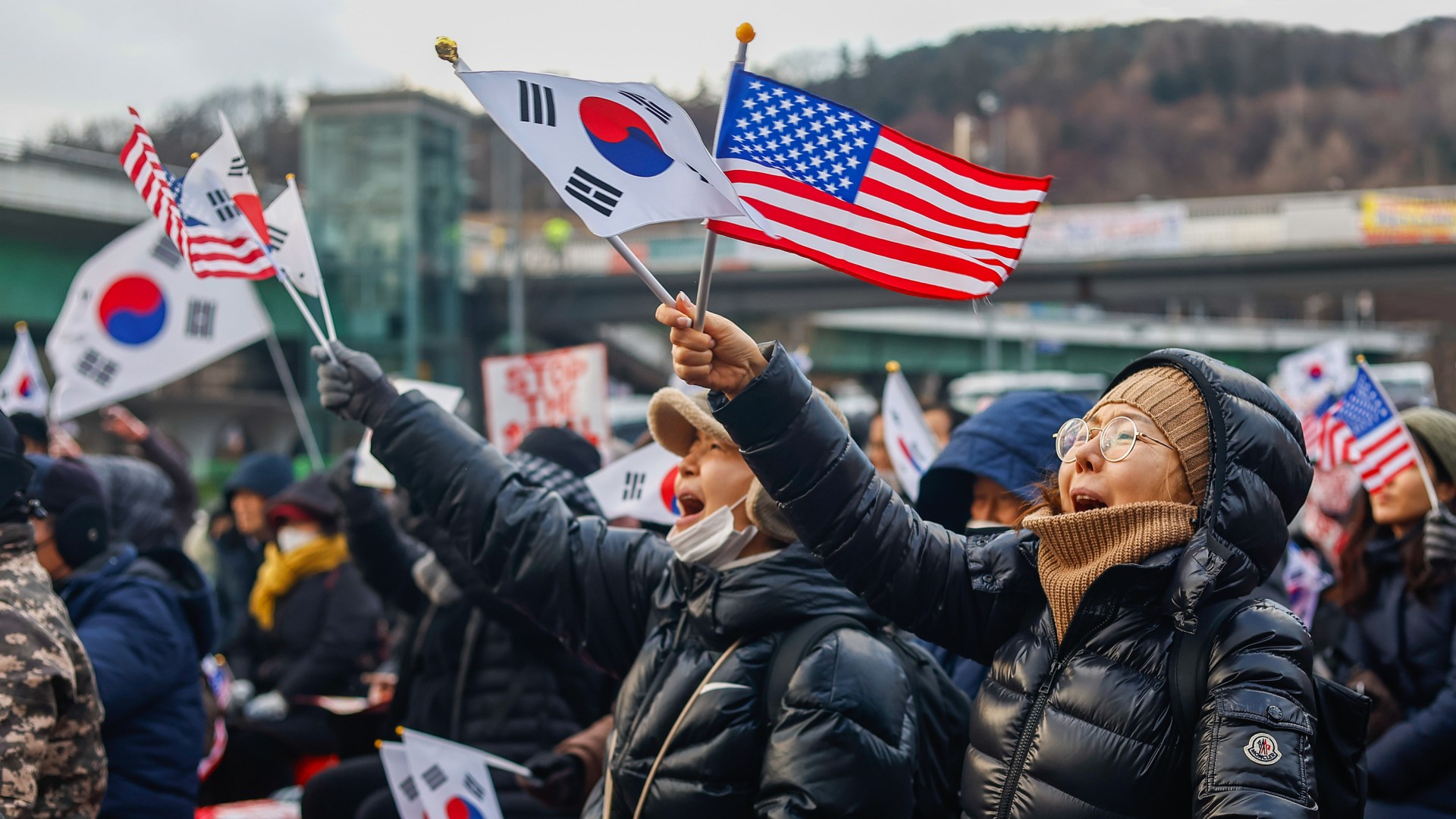 People taking part in a rally in Seoul, South Korea in support of impeached president Yoon Suk Yeol.