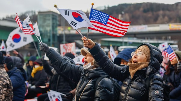 People taking part in a rally in Seoul, South Korea in support of impeached president Yoon Suk Yeol.