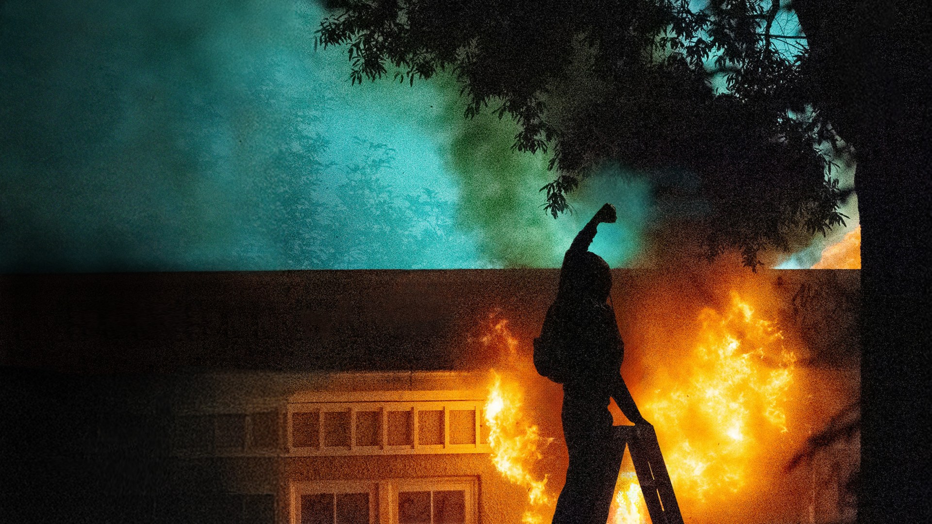 A photo of someone setting fire to a house.
