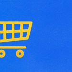A yellow shopping cart on a blue background