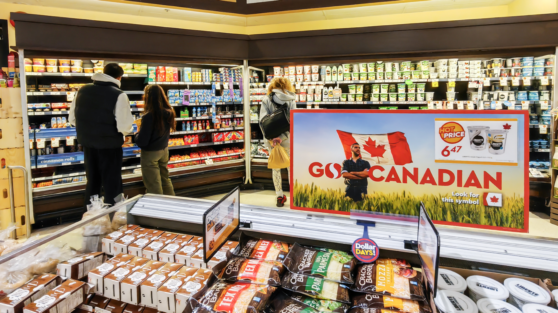 Canadians shop in a grocery store ahead of US tariffs