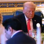 Donald Trump and Paula White-Cain pray