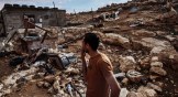 A home and farmland damaged by Israeli settlers who trespassed and vandalized property in the West Bank.