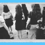 A group of young woman standing in a photo